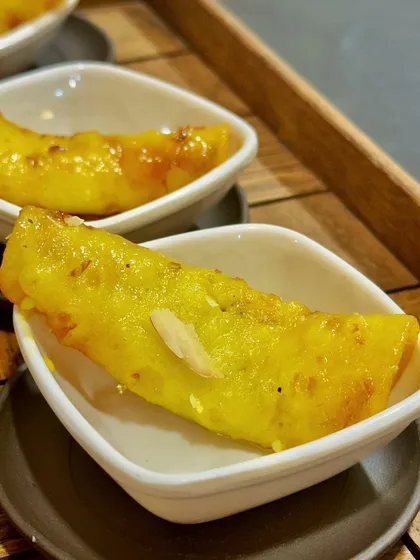 My Stuffed Malpua is a rich and indulgent dessert. The sweet pancake is stuffed with a mixture of dry fruits and mawa, fried in ghee, and soaked in syrup for a truly decadent experience.