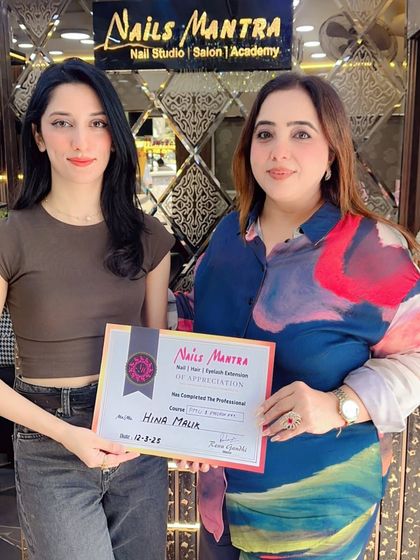 Hina Malik smiles as she receives her certificate of completion. It is always rewarding to see our students ready to enter the professional world with confidence.