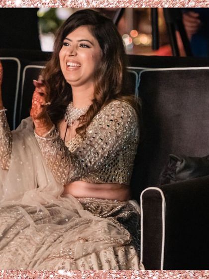 The bride's priceless reaction while watching her groom's surprise performance. This is what it's all about!