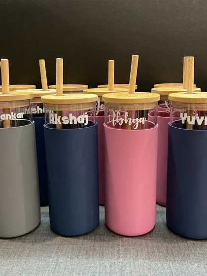 A large order of our borosilicate glass tumblers with bamboo lids, personalised for a corporate event or a large group gifting.