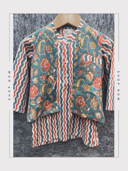 Here is the matching boys' bandi and kurta set, designed to coordinate perfectly with his sister's outfit for a complete twinning look.