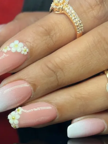 Another detailed shot of the tiny, hand-sculpted flowers on the elegant ombre base.