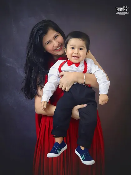 The bond between a mother and her son is so special. This happy portrait from their family session is filled with so much love and joy.