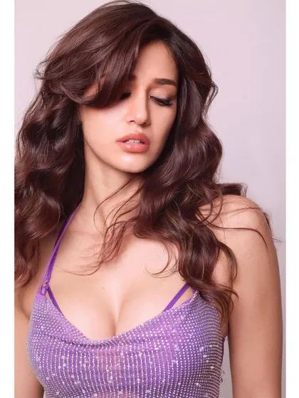 For this shoot, I styled Disha Patani in a sparkling lavender mini dress from Itrh. This look is playful, glamorous, and perfect for showcasing a fun and confident personality.