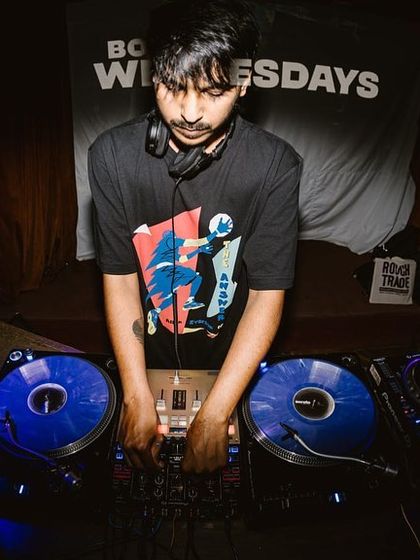 A photo from my set at Boxout Wednesdays in Delhi, showing me working the turntables.