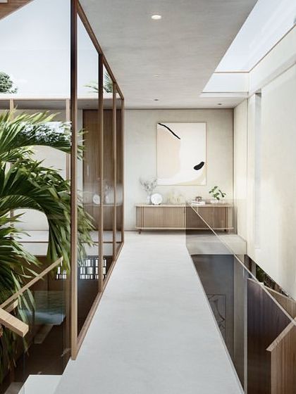 The walkway connecting the bedroom and bathroom in a Pavilion home runs alongside an internal courtyard. This design ensures that even transitional spaces are filled with natural light and a connection to greenery.