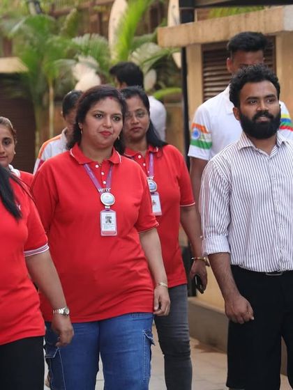 Walking with the faculty of Witty International School during their event. Partnerships with educational institutions are key to our mission of making fitness accessible to more children.