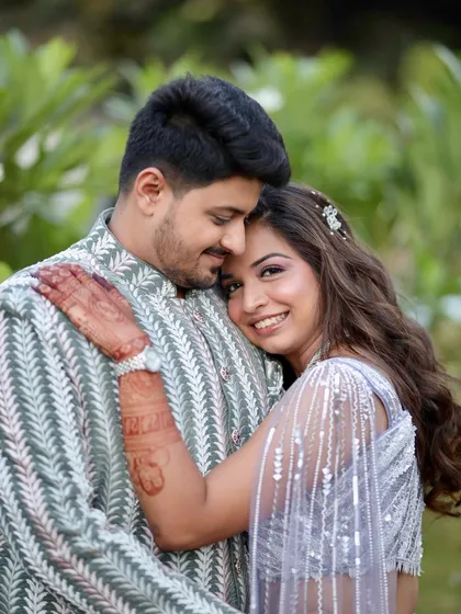A beautiful, happy moment from an engagement shoot. Her makeup was designed to look fresh and natural in the daylight, with an emphasis on glowing skin and soft definition that enhances her features.
