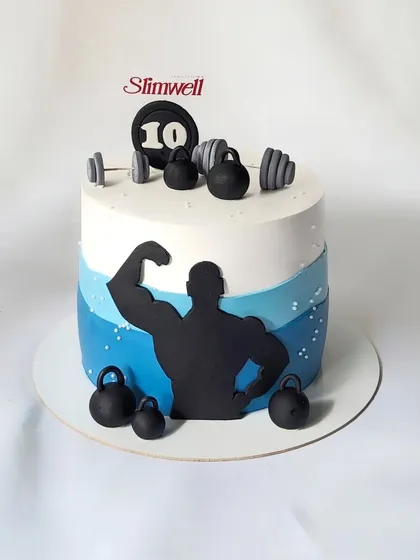 I created this cake for the 10th anniversary of Slimwell Fitness Gym. The design uses a powerful bodybuilder silhouette and kettlebell accents to capture the brand's identity and celebrate a decade of success.