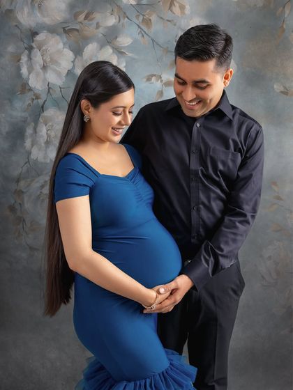 Capturing the genuine smiles and shared joy is what makes these couple maternity portraits so special.
