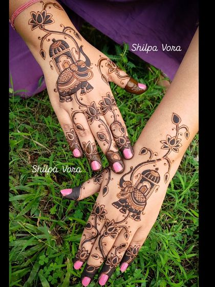 A playful and elegant design with elephants and lotus vines, perfect for any celebration.