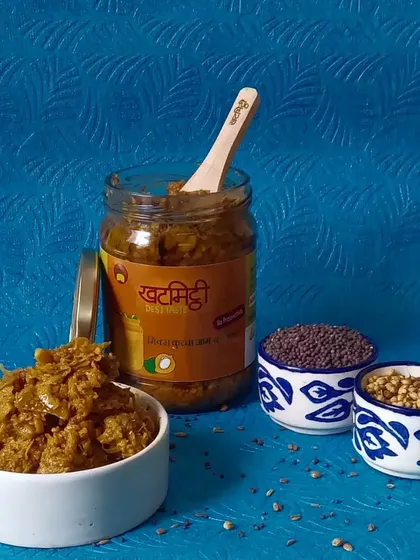 My Kuchha Mango pickle, made from grated raw mangoes, is a tangy and spicy delight. It's perfect for mixing with dal-rice.