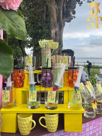 A colorful and quirky bar display for a Goa pool party. We use fun glassware like skull mugs and tiki cups to match the playful, paradise theme.