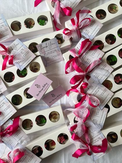 So many boxes of love going out for Valentine's Day. Each box of my handmade chocolate discs is tied with a ribbon, ready to be gifted.
