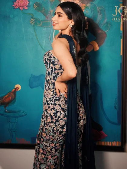 A profile of grace. Khushi Kapoor's elegant silhouette is highlighted by the sparkle of her floral diamond earrings, a perfect complement to her embroidered gown.