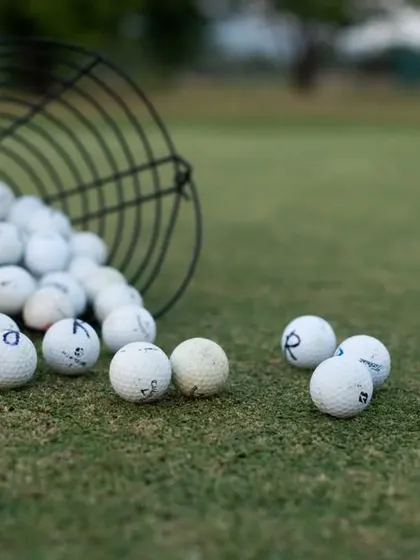 A close-up of our practice balls on the green. Every ball represents an opportunity to improve and perfect your technique.