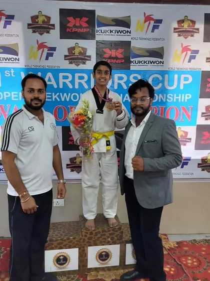 Celebrating a win at the 1st Warriors Cup. We are there to guide our students through every match.