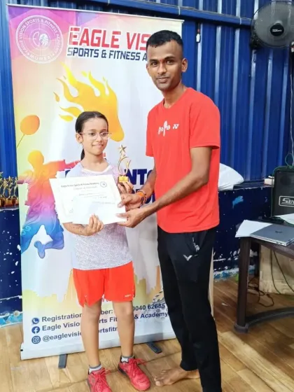 Kashvi Uchil receives her silver medal for the U13 Girls Singles category at the Eagle Vision Badminton Tournament in Borivali.