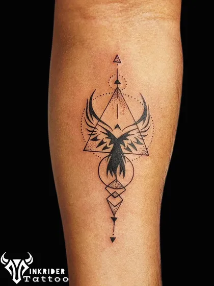 A geometric phoenix tattoo, symbolizing rebirth and resilience. The design combines the mythical bird with triangles and circles for a modern, sacred geometry feel.