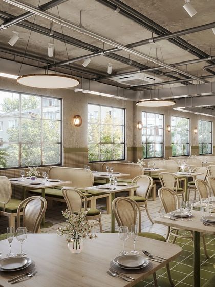 This visualization of a large, open-plan restaurant or cafe features an industrial-chic aesthetic. We rendered the space to feel bright and airy, highlighting the exposed ceiling, natural wood, and green accents.