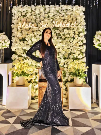 Standing proud in front of the couple's wedding hashtag. It was a night to remember as Astha Got Mohit-ched, and I was thrilled to be the one guiding the celebration.