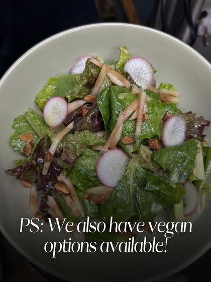 My menu is designed to be inclusive for everyone. This fresh salad is just one example of the many delicious and wholesome vegan options available at the cafe.