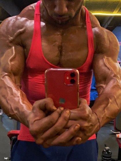A throwback to being completely shredded. This close-up shows extreme vascularity and muscle hardness.