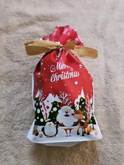 A festive Christmas potli, a great budget-friendly option for gifting chocolates.