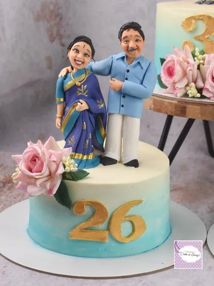 Another cake from the anniversary trio, this one celebrating 26 years. Each cake had its own personalized topper, allowing each couple to have their own special moment.