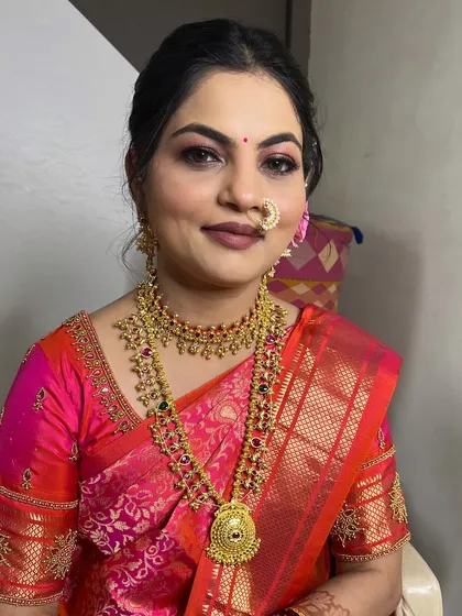 A full portrait of the client, looking stunning in her traditional attire.