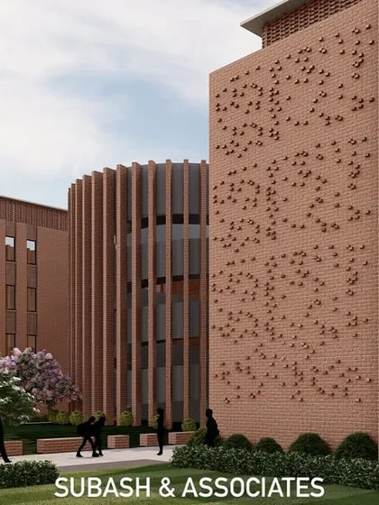 A closer perspective on our school design reveals the intricate use of brickwork. We employ varied patterns, vertical fins, and perforated jali-style screens to create a dynamic facade that is both visually engaging and functional, allowing for natural light and ventilation.