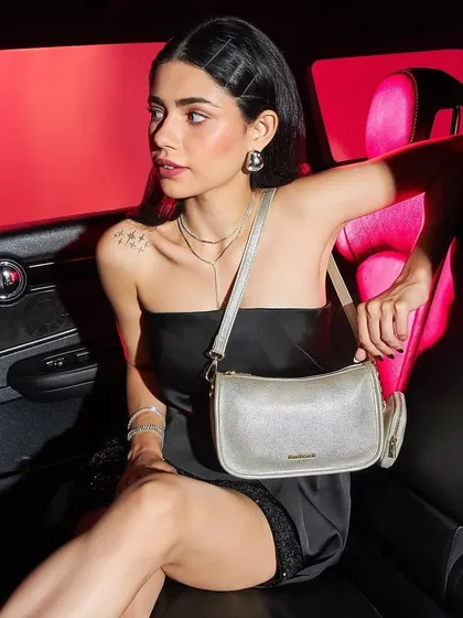 A youthful and edgy look created for a Fastrack campaign. The makeup was designed to feel modern and glamorous for a night-out scene, featuring glowing skin and defined eyes that stand out in a low-light, high-contrast setting.