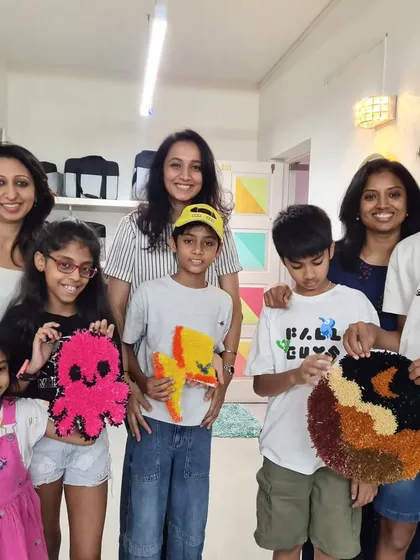 Art is for everyone in the family! This happy group of kids and adults had a blast at a private tufting party, each making their own unique creation.
