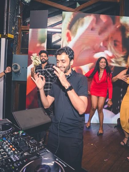 The crowd dancing right next to the DJ booth. I love it when the energy is this close and personal.