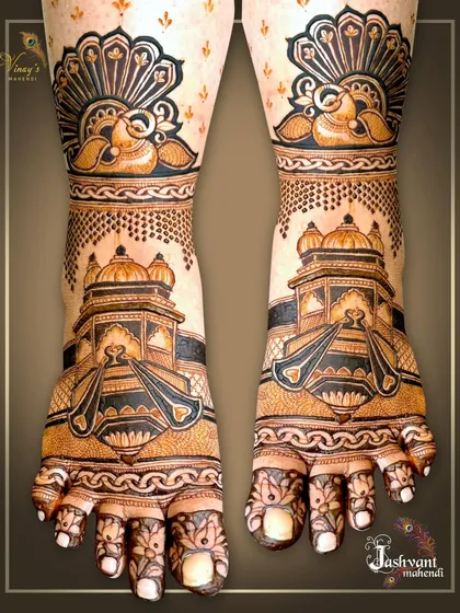 A variation of the palace feet mehndi, this design shows the intricate details from a slightly different angle, emphasizing the bold lines and shading.