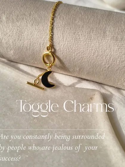 Another view of my black onyx Luna toggle charm. It's a powerful piece for anyone feeling the weight of others' envy, designed to protect your energy and help you stay focused on your success.