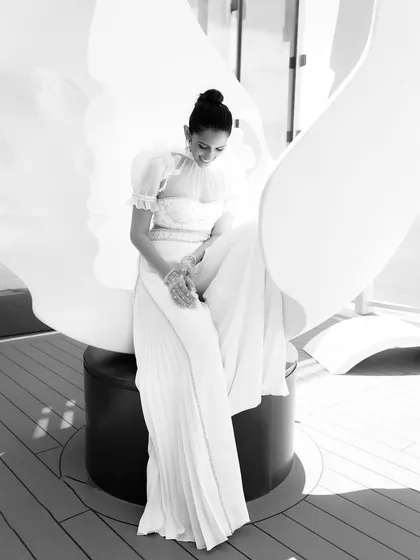 A full-length black and white shot of the Sabina Bilenko outfit, showing its graceful and unconventional silhouette.