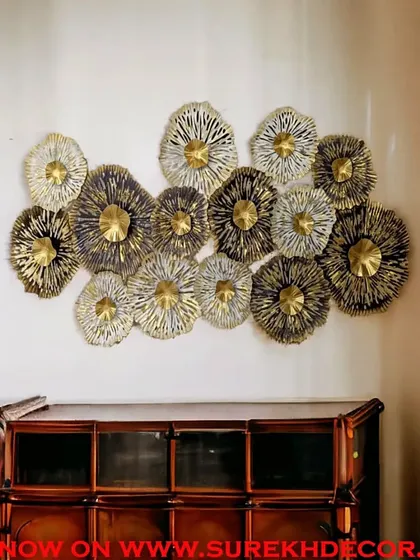 Incredibly designed, this metal wall decor showcases a cluster of flower-like forms in brown, silver, and gold. The intricate detailing and antique finish make it a sophisticated and artistic addition to any interior.