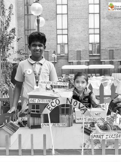 A student presents his innovative model for a sustainable house at the Paryavaran Rakshak Programme. It's inspiring to see young minds designing solutions for the future.