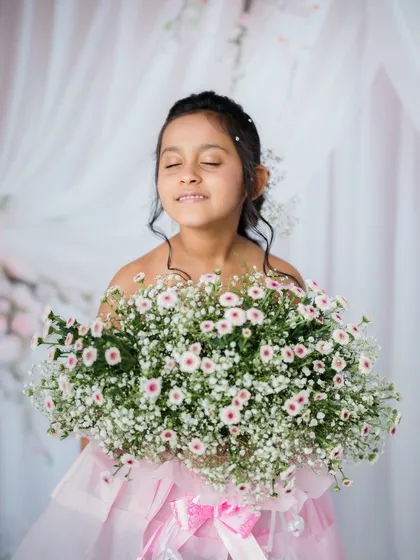 A moment of pure bliss, with her eyes closed and a gentle smile.