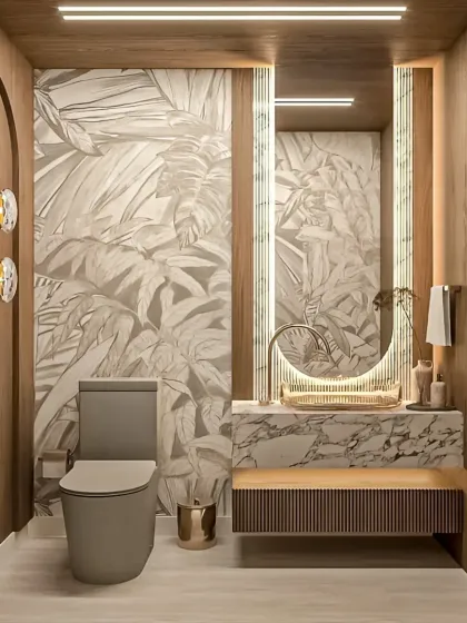 This powder room design makes a bold statement in a compact space. We used rich wood paneling, a striking botanical wallpaper, and a floating marble vanity with integrated lighting to create a sense of warmth and luxury.