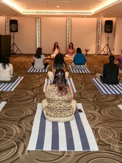 Here I am leading a corporate wellness session that combines sound healing and gentle yoga. It’s a wonderful way for teams to de-stress, reconnect, and bring a sense of balance into their workday.