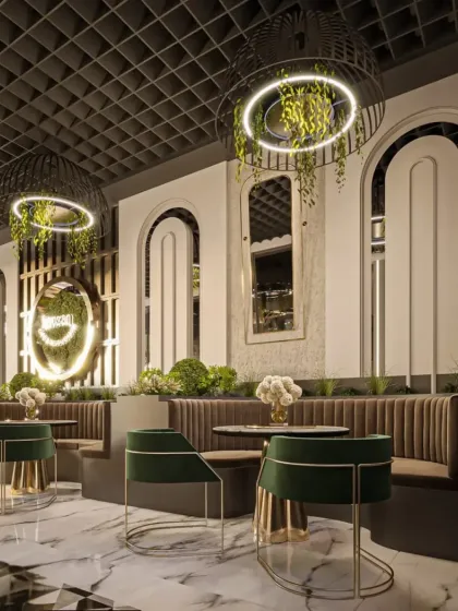 This view focuses on the cozy booth seating, with plush velvet upholstery and integrated planters. The design uses mirrors and lighting to make the space feel both intimate and open.