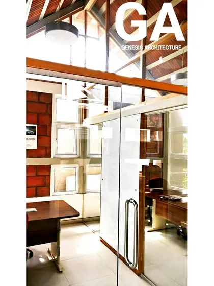 We believe an office should be a place you want to be. This climate responsive office in Bangalore uses exposed brick, a high ceiling with wooden beams, and ample natural light to create a workspace that is both inspiring and energy efficient.