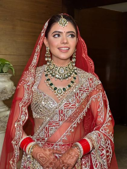 A beautiful candid moment of my smiling bride. The makeup was designed to look fresh and radiant, even under the veil.