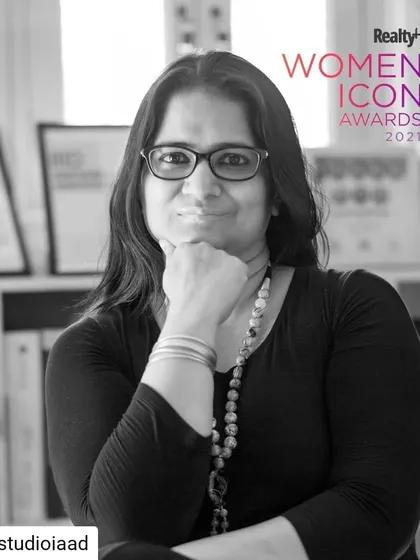 A black and white portrait of our founder, Rachna Agarwal, accompanying the announcement of her win at the Realty+ Women Icon Awards 2021. This award recognized her as a 'Woman Achiever in Leading Flexispaces'.