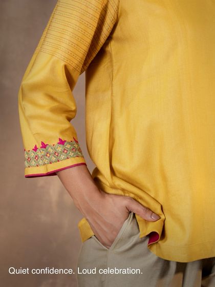 Quiet confidence, loud celebration. This image captures the essence of the Ruhani collection, where understated design meets the joyful spirit of handcrafted details, including the ever-practical pocket.