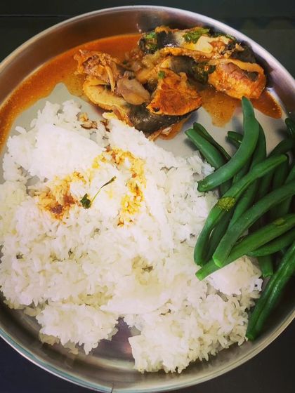 Here is the finished Naga fish curry plated as a simple meal. It's served with steamed white rice and a side of healthy boiled green beans.