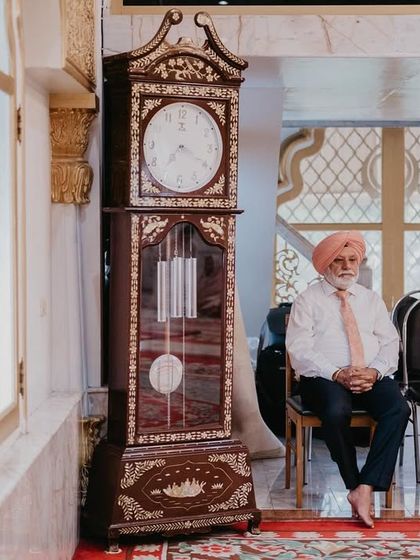 Two elders waiting patiently for the ceremony to begin. I find so much character and story in the faces of the guests who are there to give their blessings.