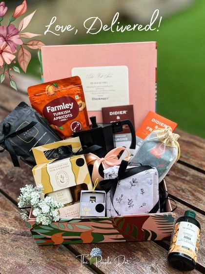 A pamper hamper for him, delivered with love. This gift is filled with wellness picks, healthy snacks, and skincare, all elegantly arranged in a stylish, reusable tray.
